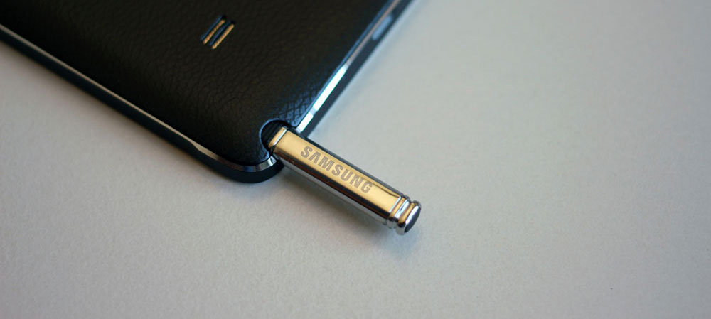 The signature Samsung S Pen being inserted into its holder